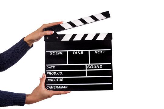 Clapperboard sign hold by female hands.