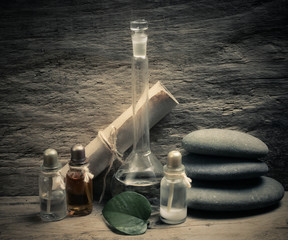 Fototapeta na wymiar Vials of perfume oils in fragrance lab