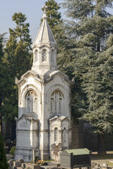 Fototapeta na wymiar decorated mausoleum at Monumental Cemetery, Milan