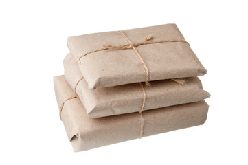 pile parcel wrapped with brown kraft paper