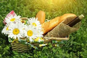 Basket with food and flowers