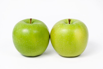 Sliced green apple isolated on white background