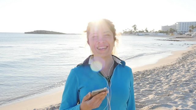 Sporty fitness woman on beach