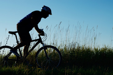 Fototapeta na wymiar Male cyclist driving outdoors