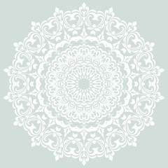 Oriental light blue and white pattern with arabesques and floral elements. Traditional classic ornament