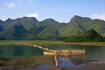  Tourist boat on terrestrial halong bay, Trang An, Ninh Binh, Vietnam