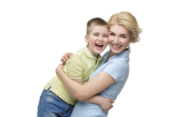 Young mother hugging son