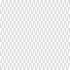 Fototapeta premium Geometric pattern with gray and white triangles. Seamless abstract background