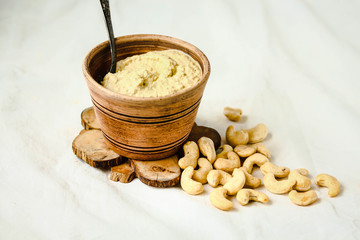 Cashew sauce for salad, raw vegan cheese from nuts with nutritional yeast