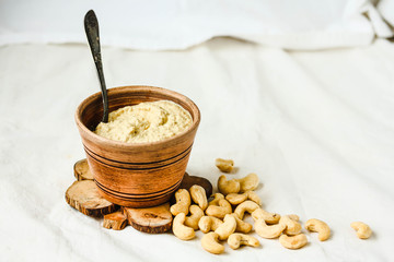 Cashew sauce for salad, raw vegan cheese from nuts with nutritional yeast