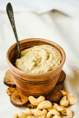 Cashew sauce for salad, raw vegan cheese from nuts with nutritional yeast