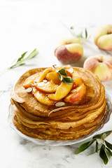 Pancakes with peaches