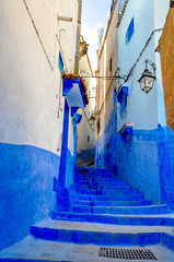 street in old Medina of the city of Shefshauen, Morokko. Bright saturated blue color