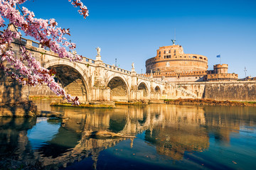 Naklejka premium Saint Angel Castle and bridge over the Tiber river in Rome