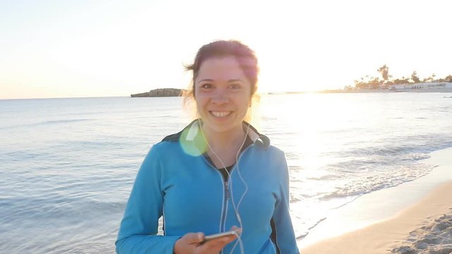 Sporty fitness woman on beach