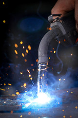 Worker welding theiron