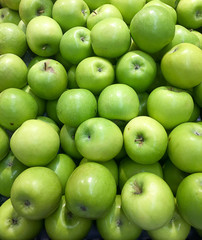 Pile of green apples at market