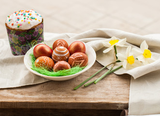 Easter decoration on a rural, wooden background. Orthodox traditions. Religious holiday.