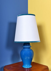 Blue ceramic lamp with white lampshade
