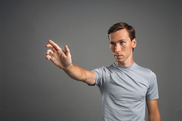 Fototapeta premium Man working with transparent virtual interface screen.