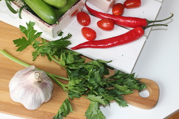 fresh vegetables and herbs, oregano, sage, chive, parsley, dill, onion, cucumber, green vegetables,  red vegetables, red pepper, pepper, garlic, cucumber, sweet corn, 