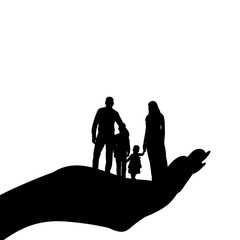 silhouette of a family with children in the palm of your hand, caring protection