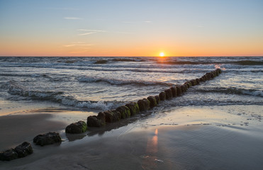 Beautiful sunset over Baltic sea. Summer landscape of Polish sea.