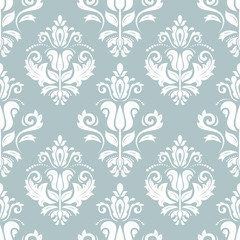 Damask classic light blue and white pattern. Seamless abstract background with repeating elements