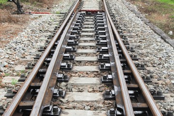 Fototapeta na wymiar railway track on gravel for train transportation: Select focus with shallow depth of field :