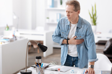 Anxious man having heart attack