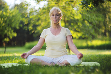 Yoga woman in the park
