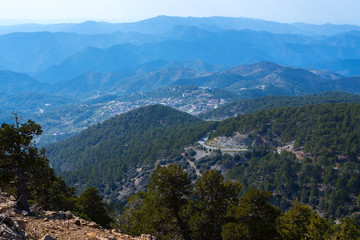 Fototapeta na wymiar Magical view of small mountain village among ridges