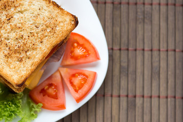 sandwich with cheese, tomato and smoked meat