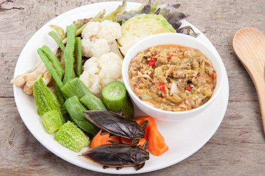 pimp chili paste or Chili paste Thai style with steamed and fresh vegetables