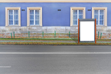 Small red blank billboard for media business advert on the road
