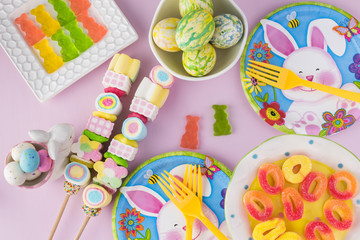 Children party table decorated for Easter celebration.