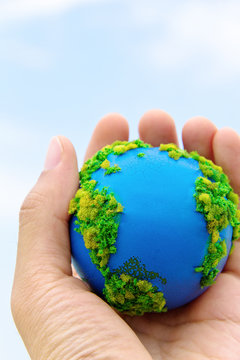 concept image of Earth in hand