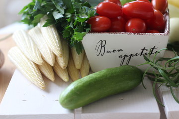 fresh vegetables and herbs, oregano, sage, chive, parsley, dill, onion, cucumber, green vegetables,  red vegetables, red pepper, pepper, garlic, cucumber, sweet corn, 