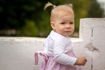 Small cute baby outdoors in the park