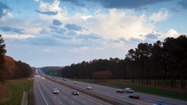 Severe Rain Storm Wet Driving Timelapse on Interstate 40 Traffic in Raleigh NC with Fast Moving Clouds and Vehicles at Sunset
