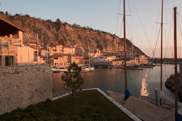 Sunset, golden light on the seaside village. Love Walk