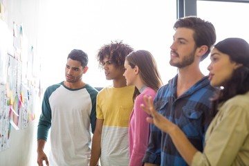 Graphic designers reading documents