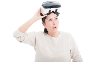 Surprising woman removing vr headset