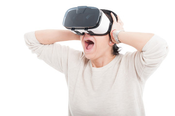 Excited woman using 3d goggles.