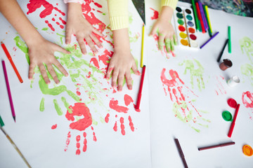 Prints of human palms on paper