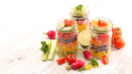 Fototapeta na wymiar healthy vegetable salad in jar
