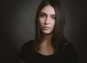 Naklejka premium Portrait of beautiful sensual woman, close-up. Studio shot.