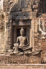 Buddha image in the ruined ancient.