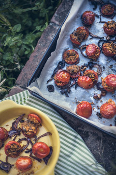 little tomatos filled of breadcrumbs and aromatics