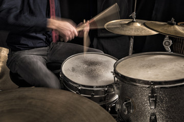 Fototapeta na wymiar Drummer playing a rhythm, motion blur
